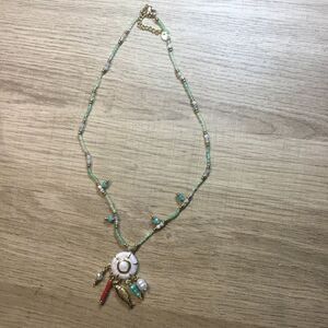 Green Beaded Pendant Necklace with Shell and Multi-Charm Accents
